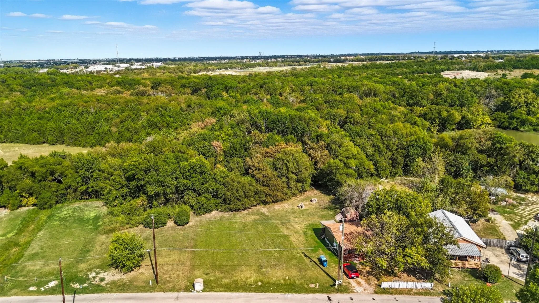Drone / aerial view of a heavily wooded area
