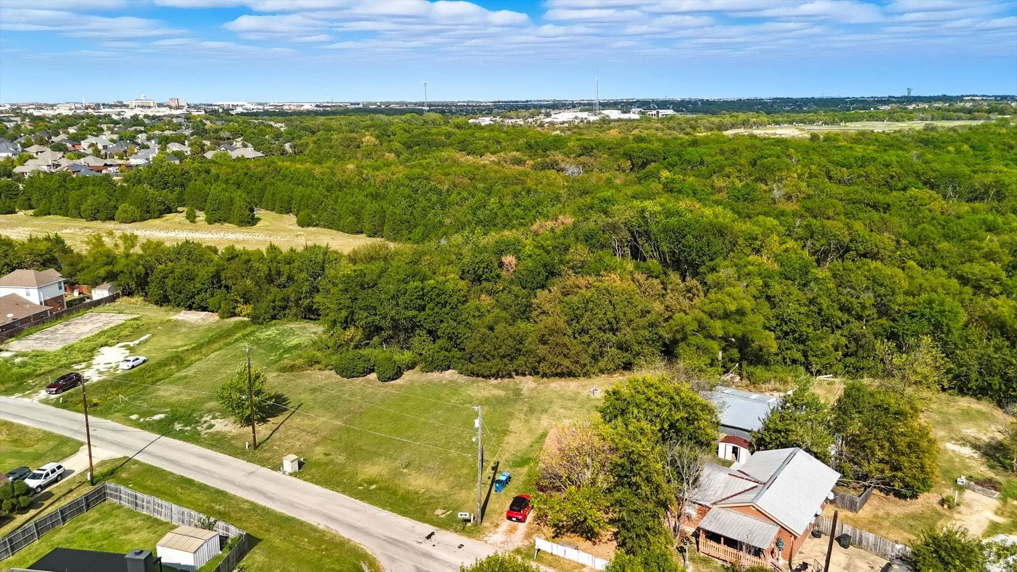Drone / aerial view of a heavily wooded area