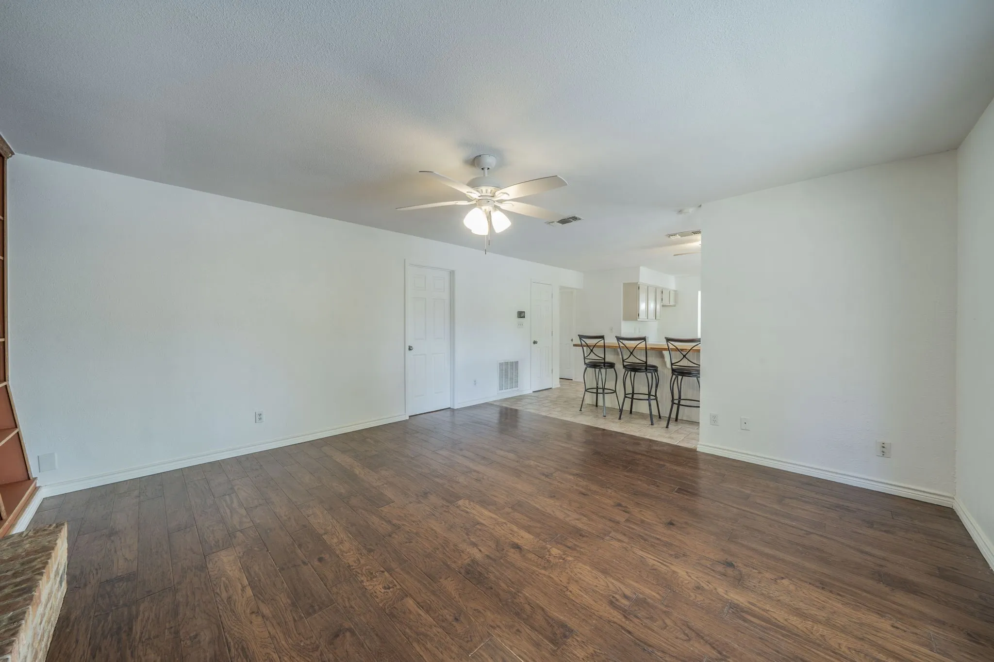 Another view of the living area in the back looking to the kitchen