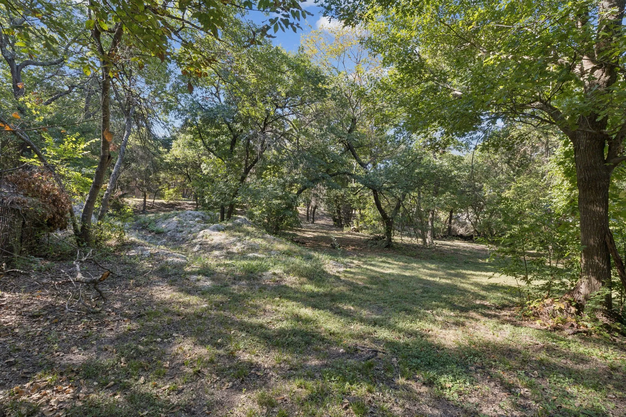 Heavily treed lot with a park like feel.