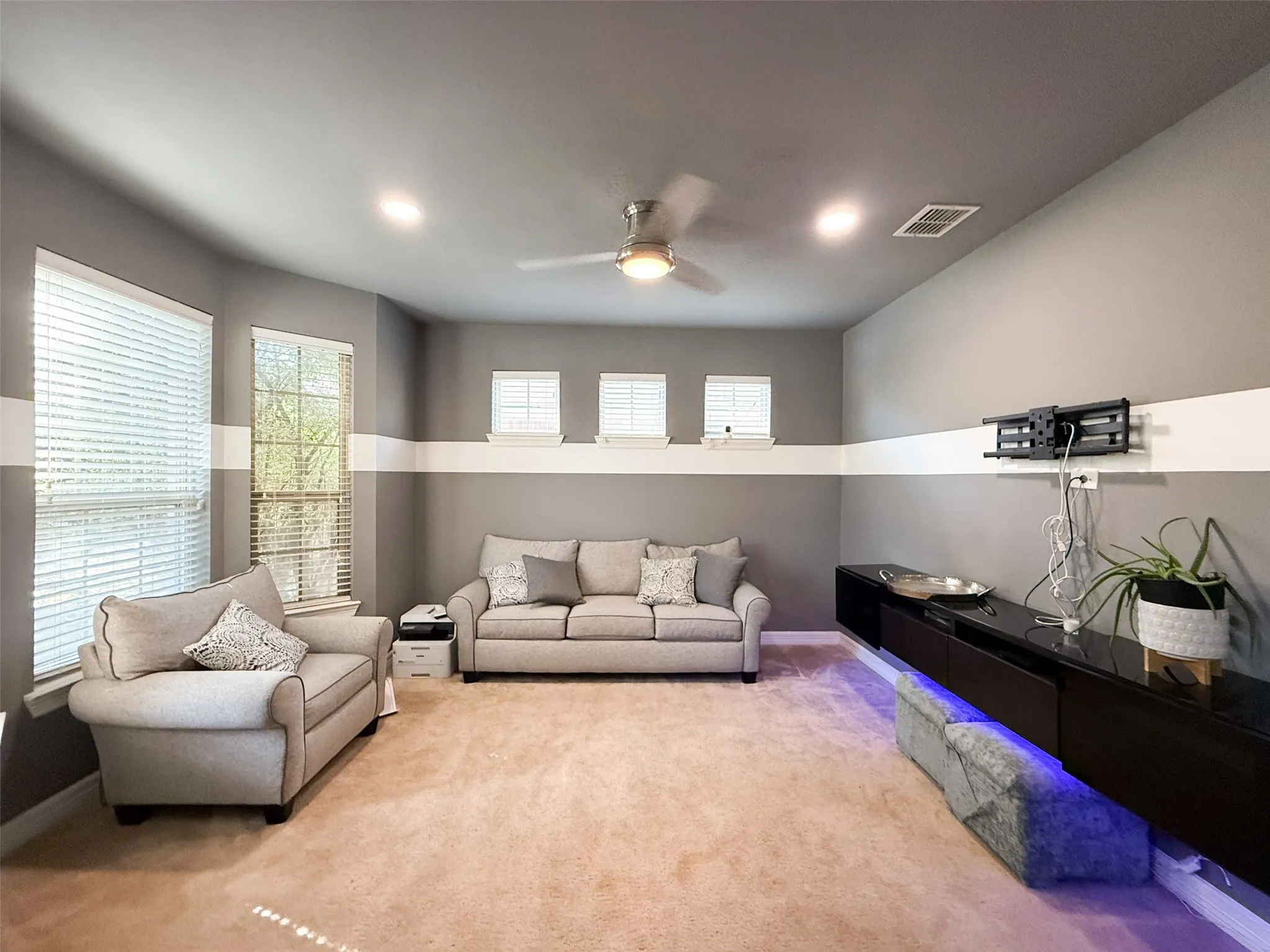 Front Living Area - flexible space perfect for a home office, playroom, or whatever fits your lifestyle