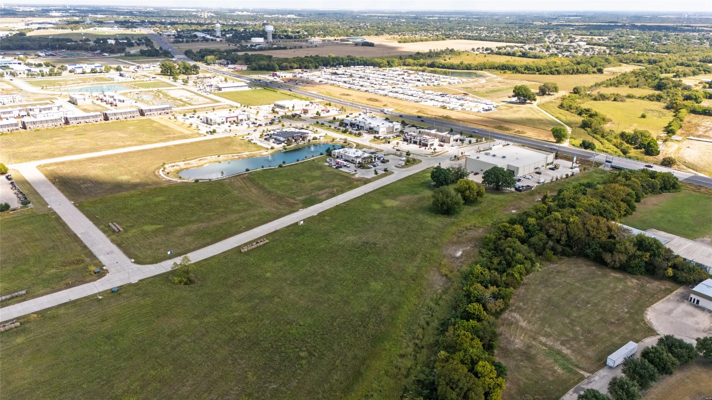 View of property location with a large body of water