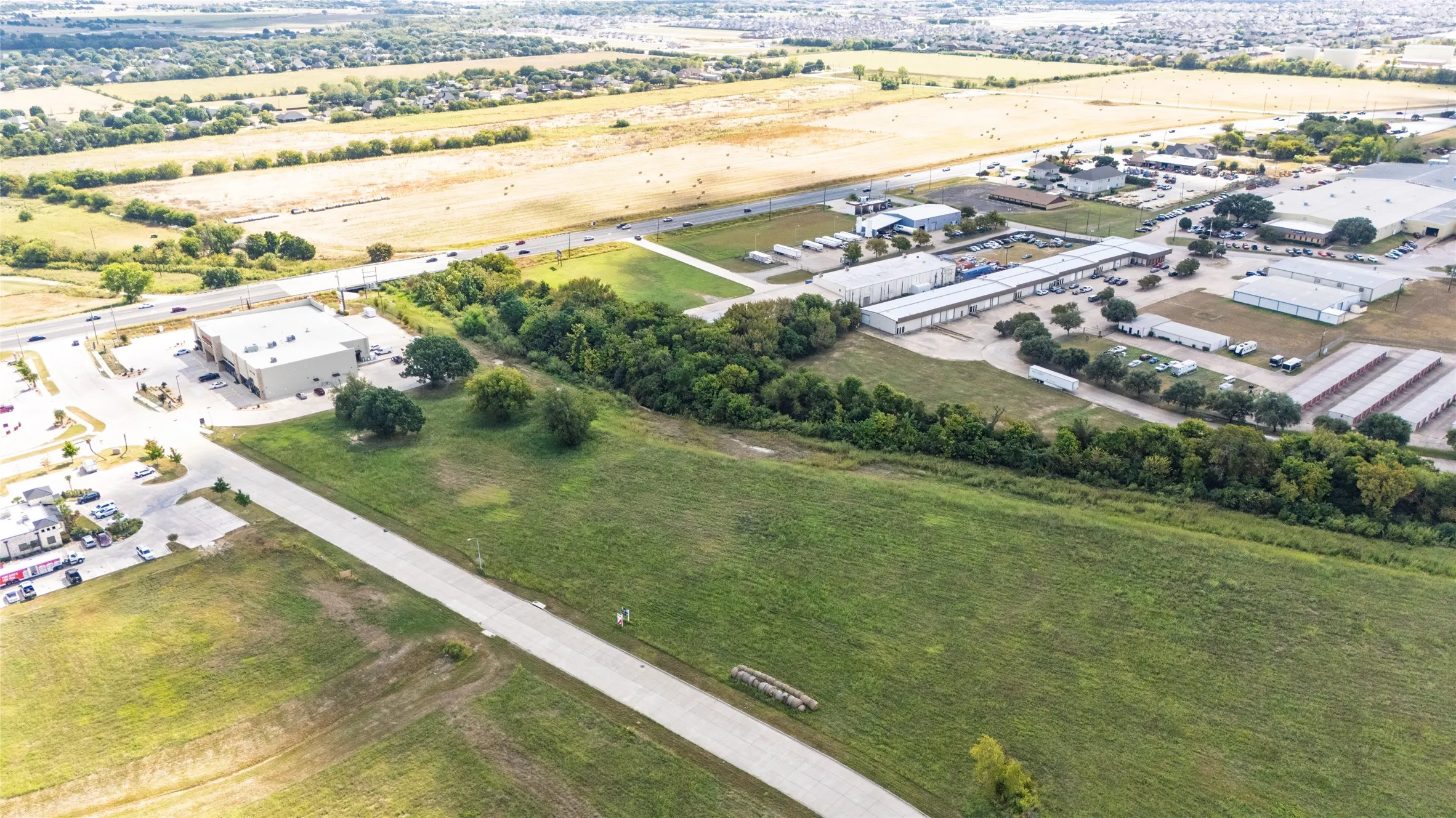 Aerial overview of property's location with industrial structures