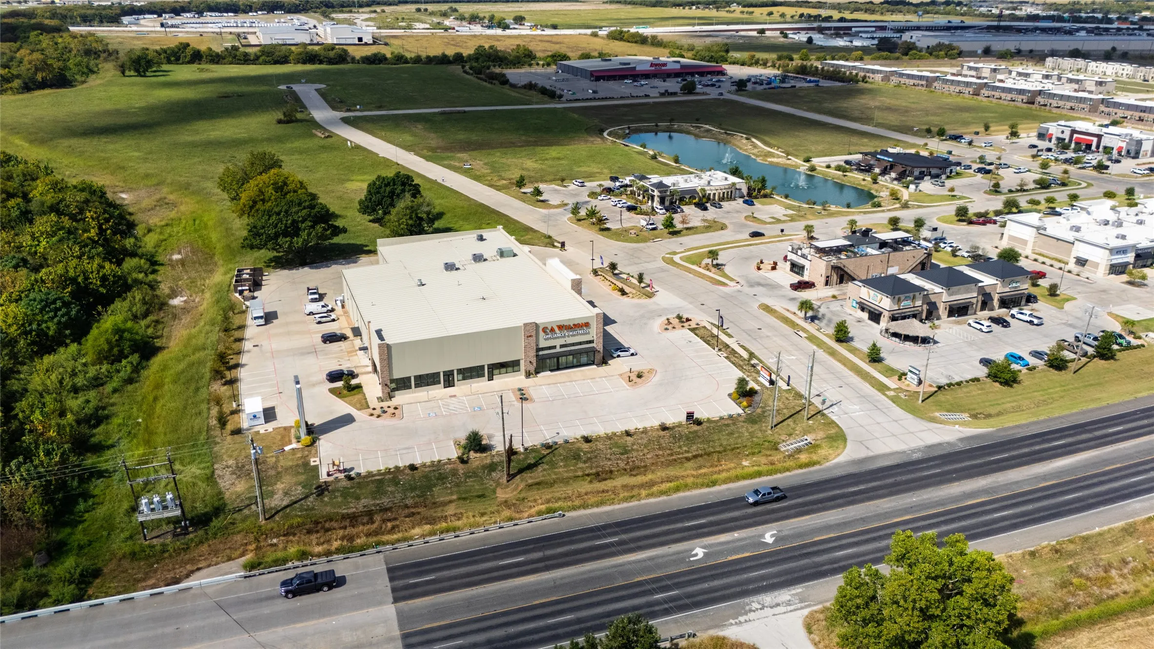 Aerial view of an industrial area and a nearby body of water