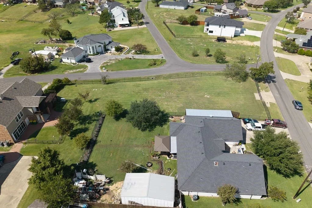 Aerial overview of property's location with nearby suburban area