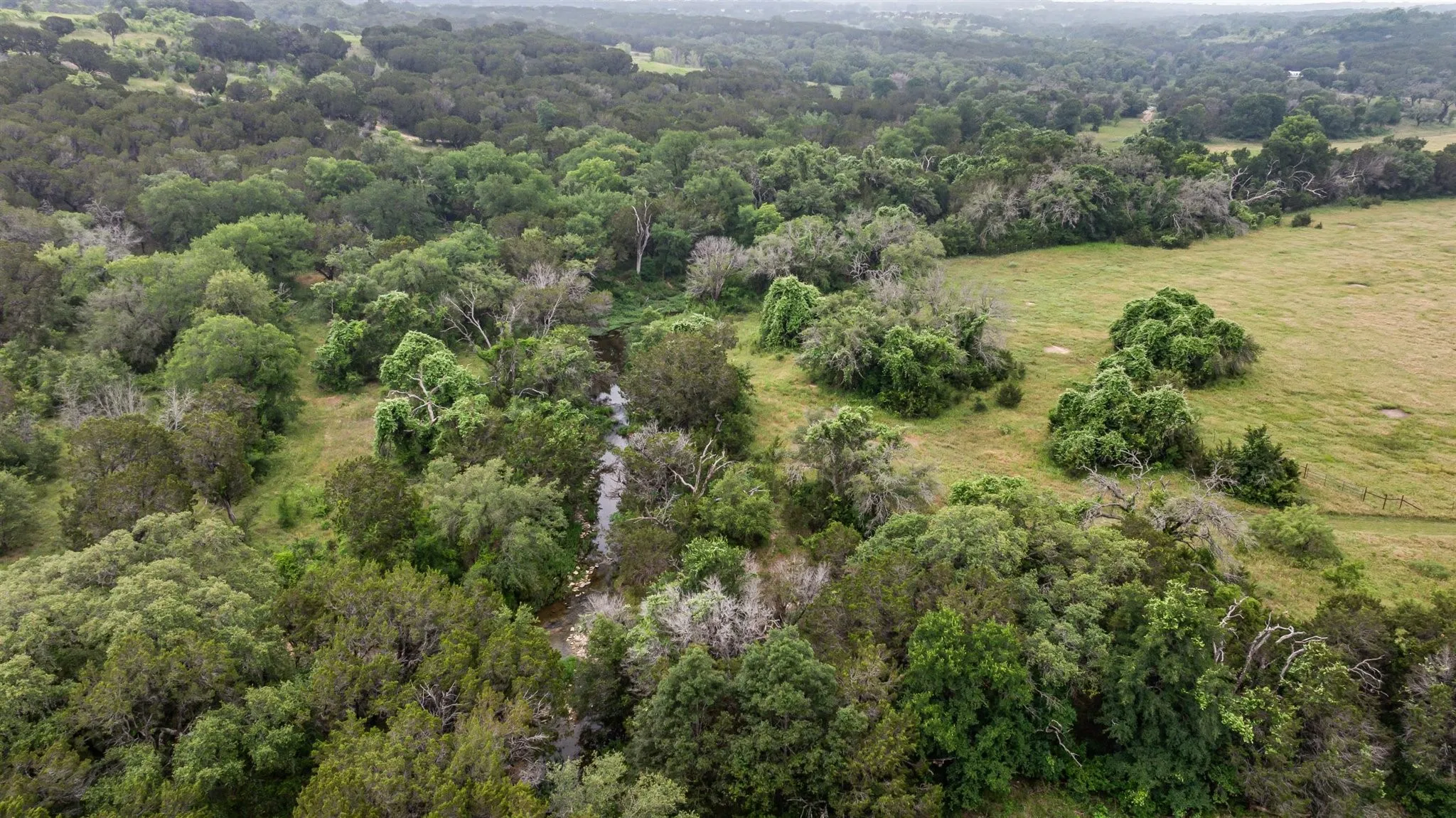 Aerial View of Creek on​​‌​​​​‌​​‌‌​‌‌​​​‌‌​‌​‌​‌​​​‌​​ Property