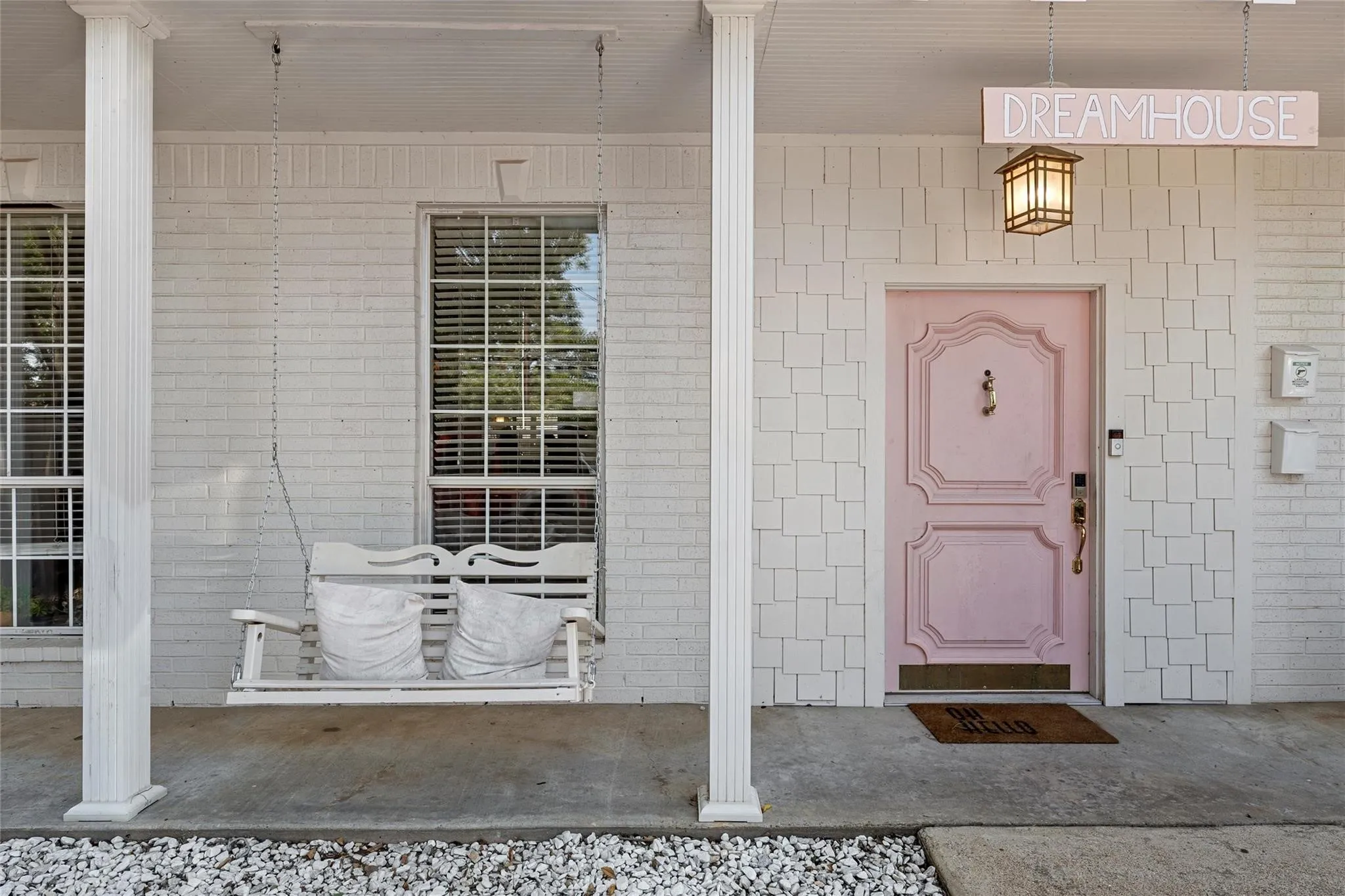 Property entrance with brick siding