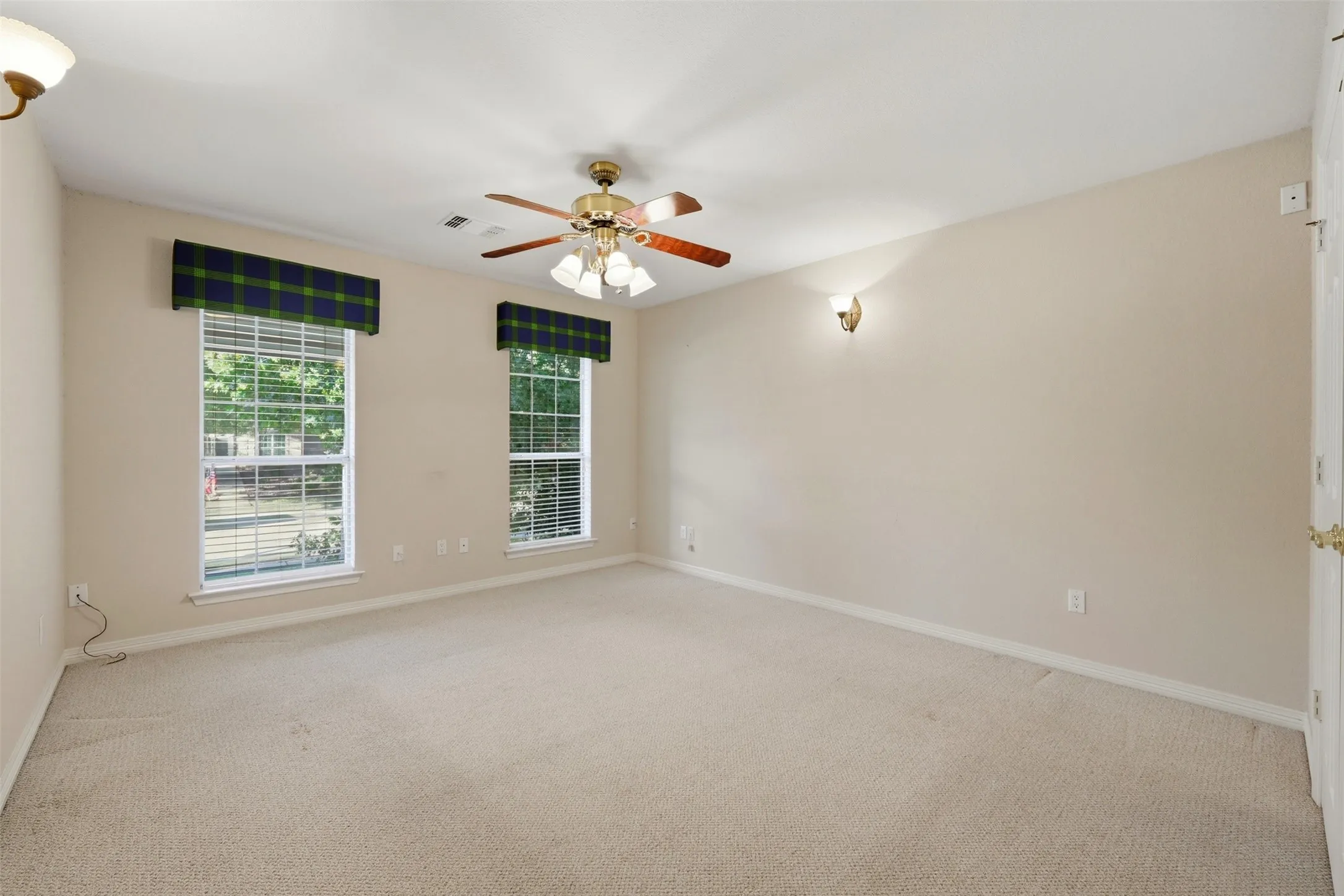 2nd floor Bedroom featuring light colored carpet and a ceiling fan