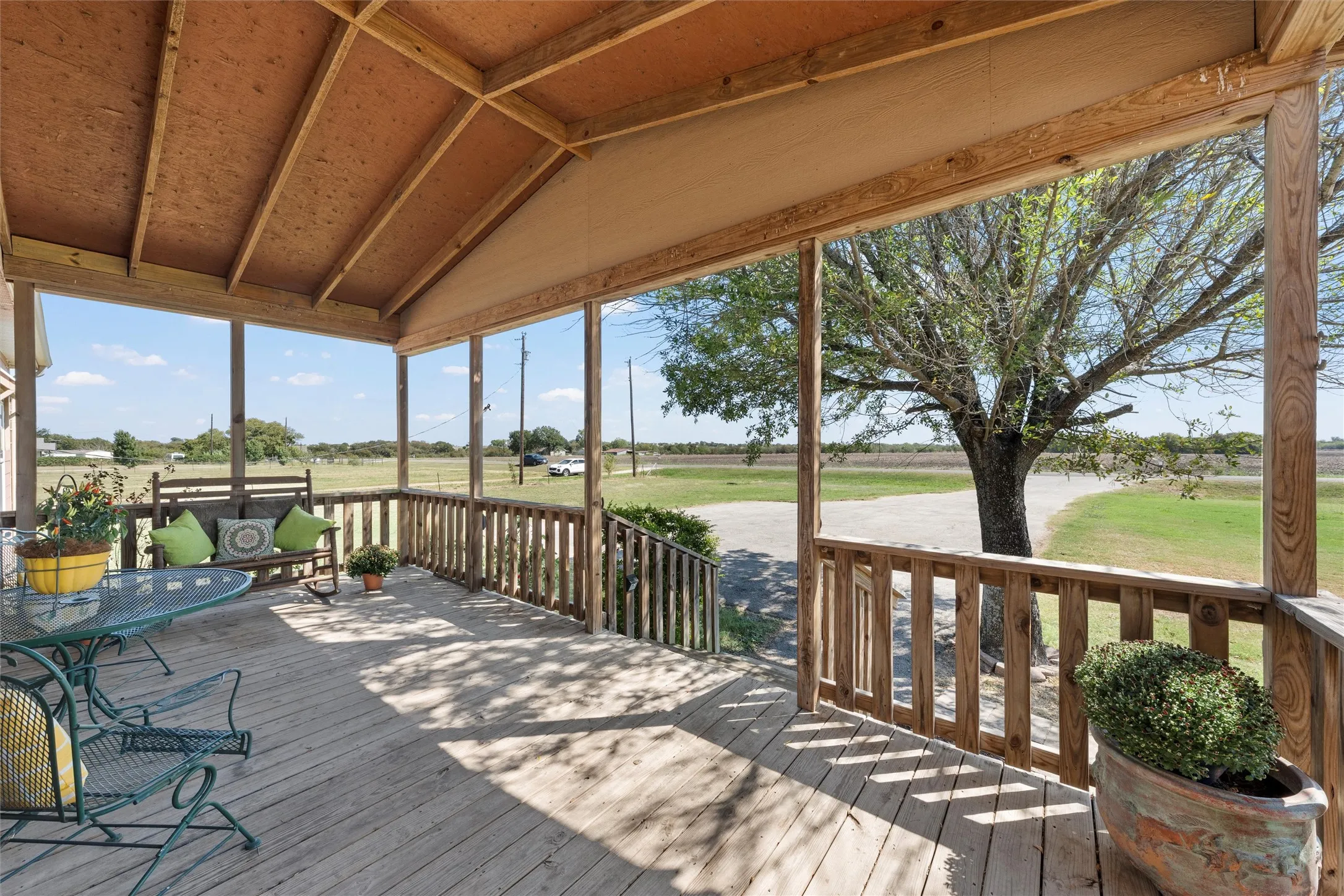 Deck featuring a lawn