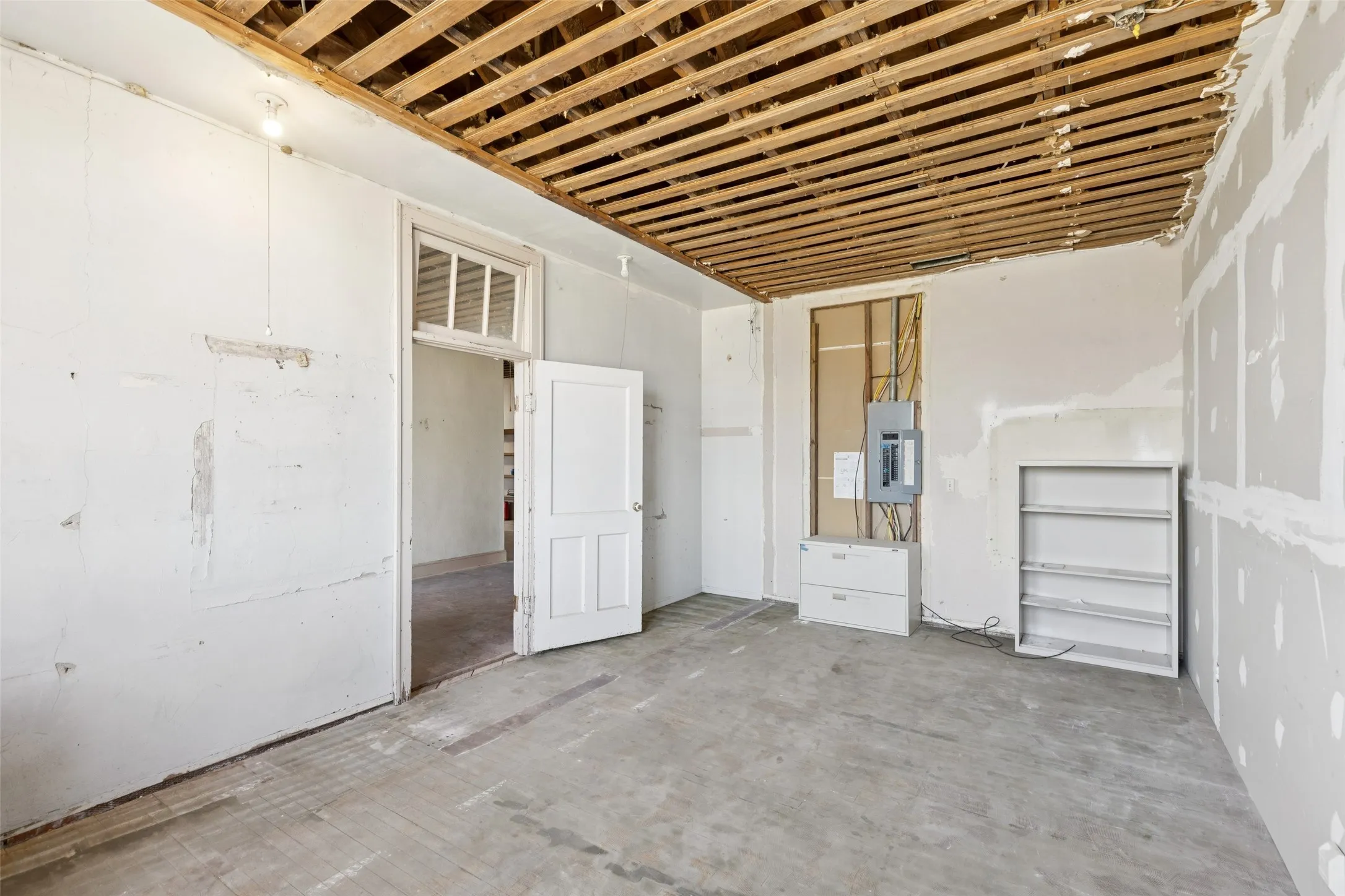 Empty room with electric panel