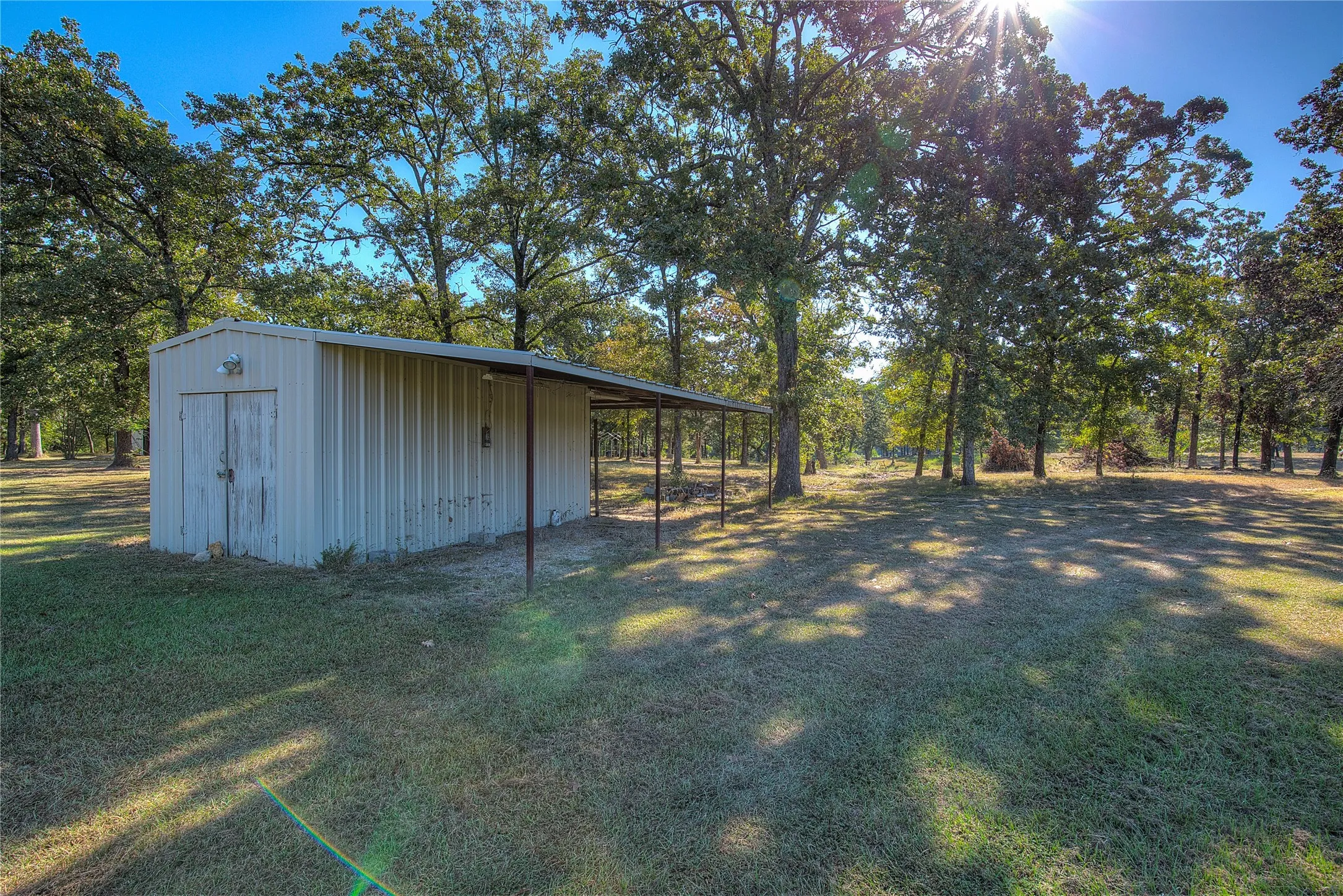 Metal workshop is 20x10, with 10- and 12-foot overhangs and electricity