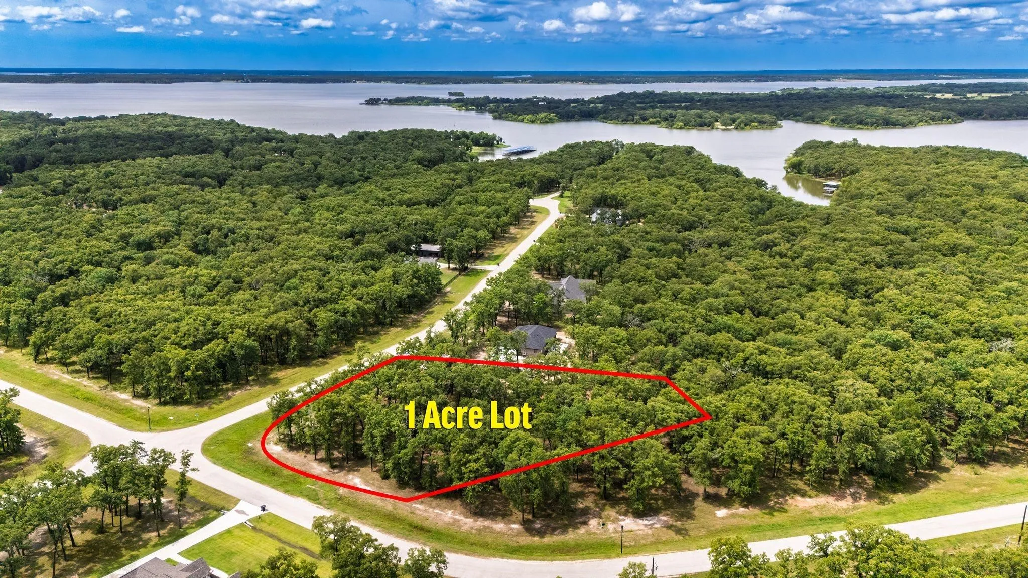 Aerial view of property's location featuring property boundaries highlighted and a large body of water