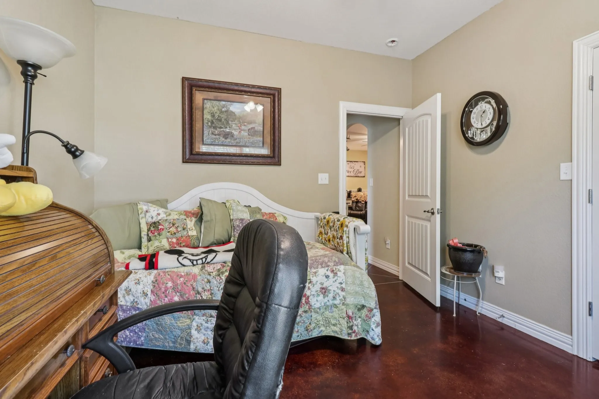 Bedroom 2 with stained concrete floors