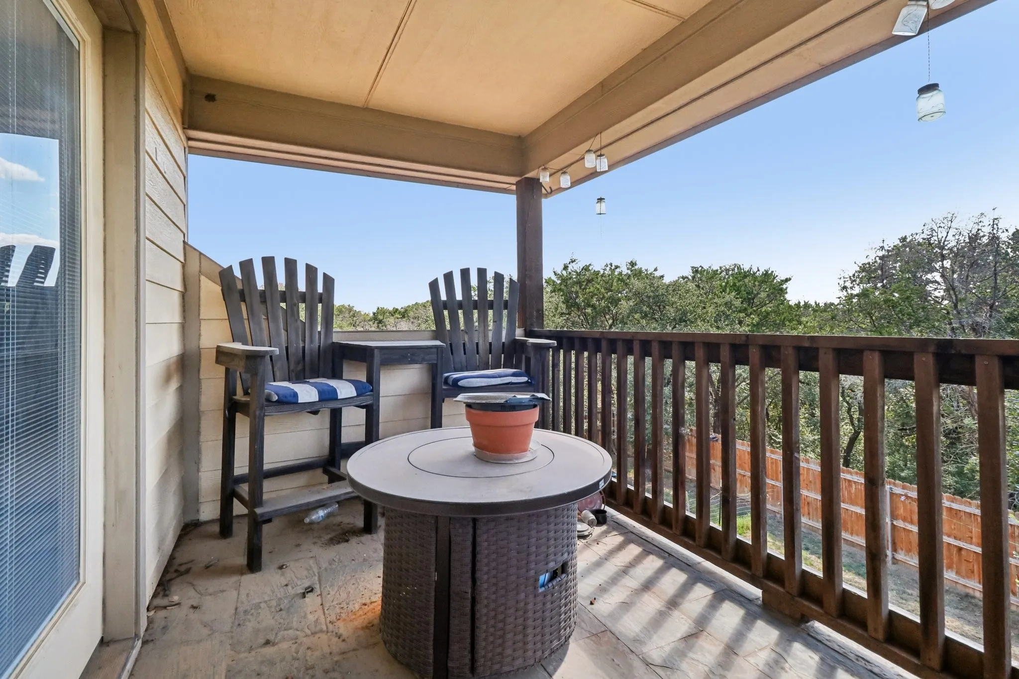 Upstairs walk out covered balcony