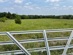 Gate featuring a view of rural / pastoral area