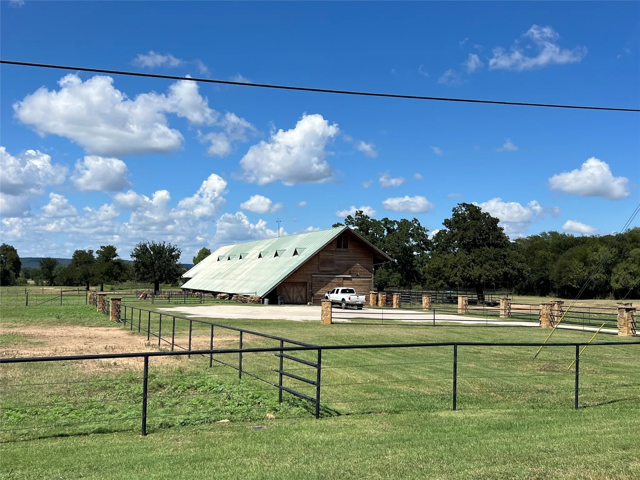 View of the horse barn & stables at 7-R Ranch Community