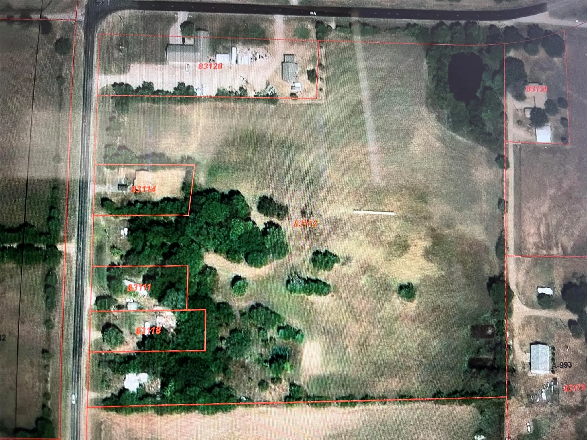 Aerial map of property and surrounding area with property boundaries highlighted