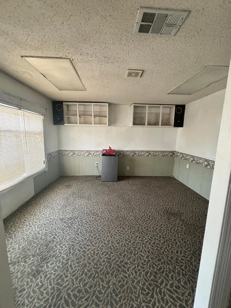 A bedroom. needs wall to close it off.