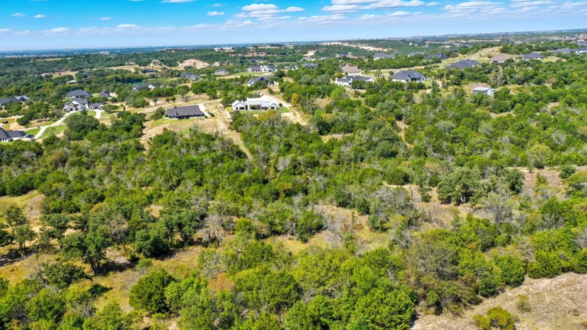 Drone / aerial view of a heavily wooded area