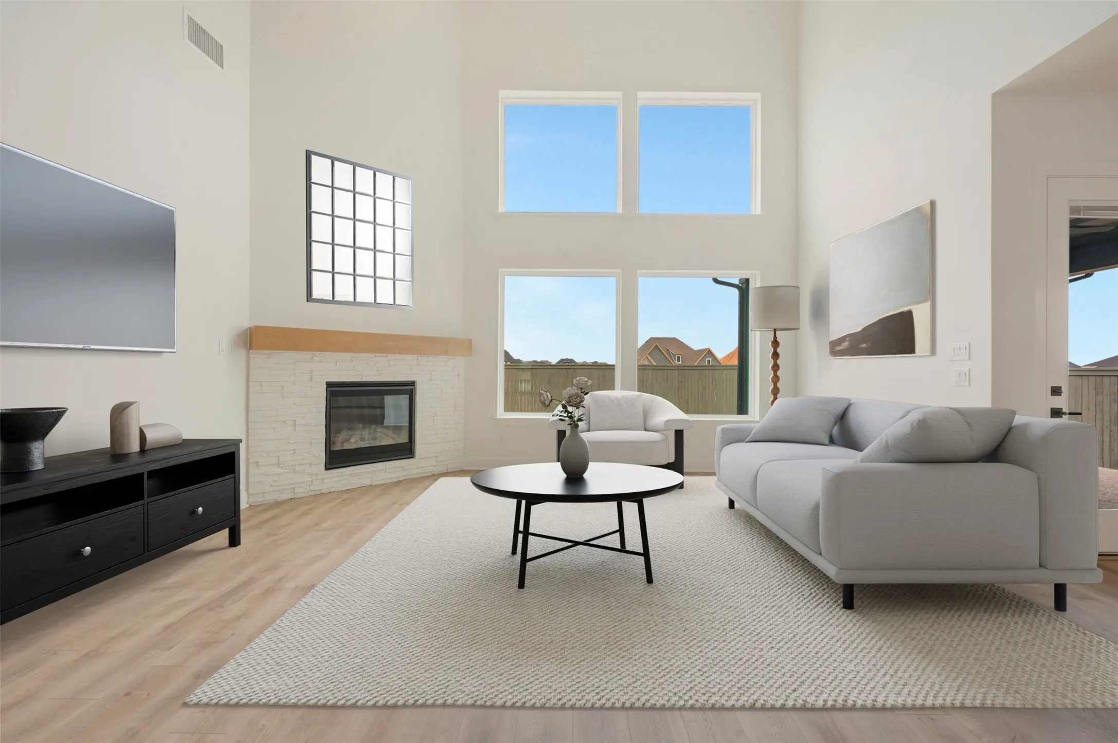 Vaulted ceilings with abundant natural light from stacked windows