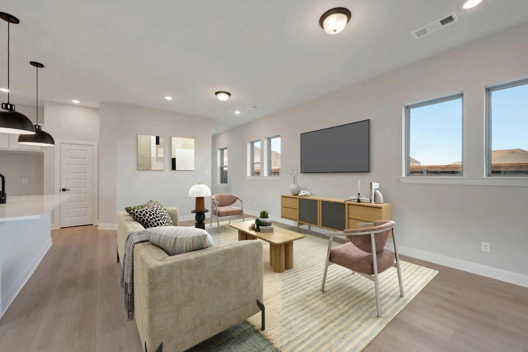 Living area featuring light wood-type flooring and recessed lighting