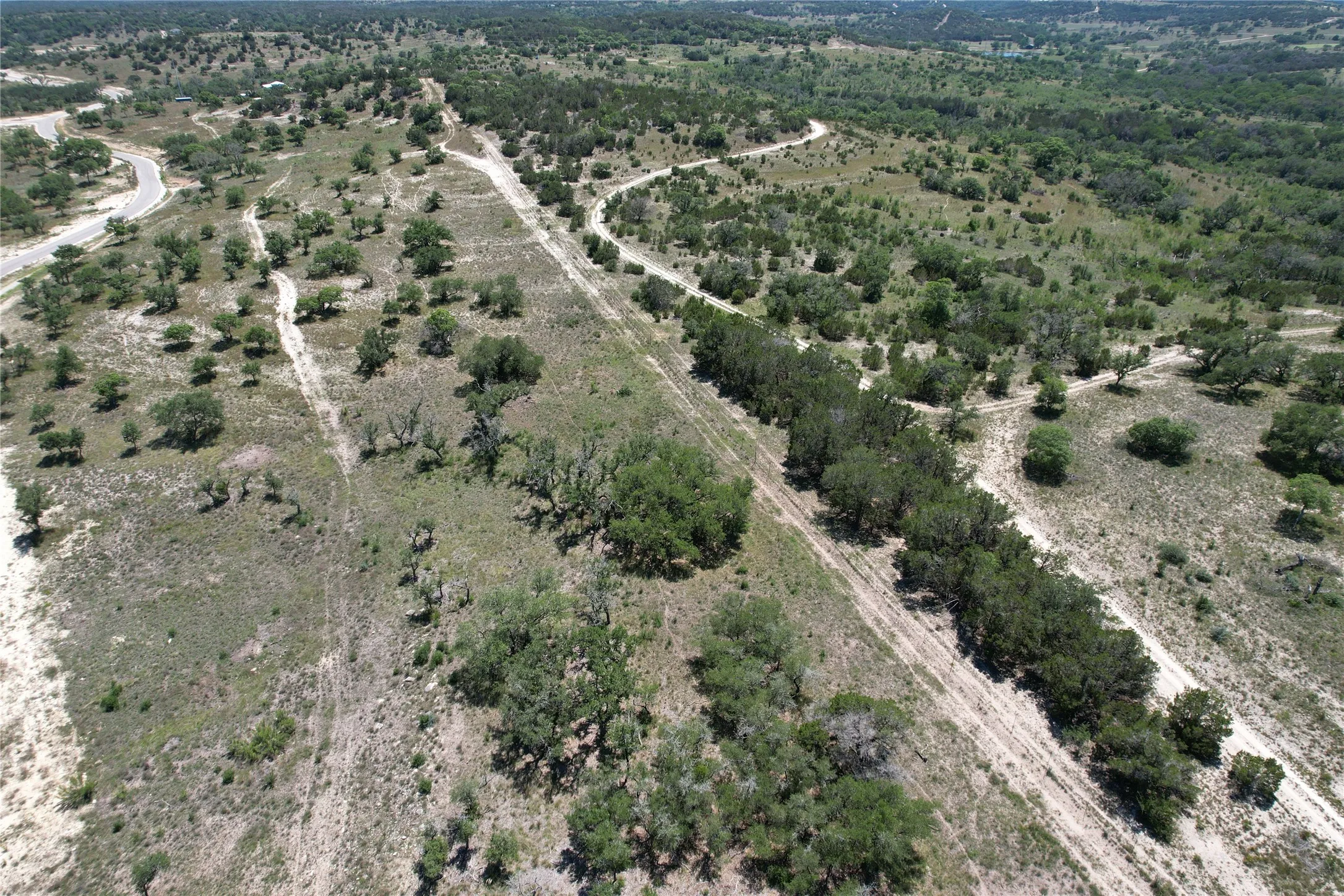 Aerial view of property and surrounding area with rural landscape