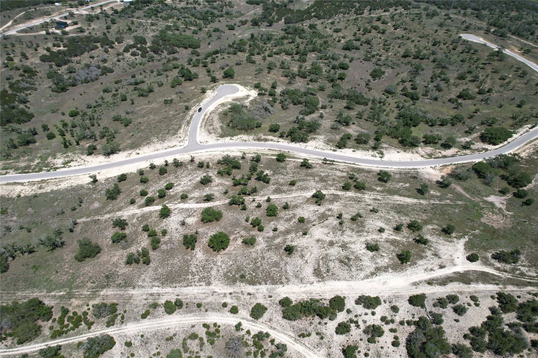 Aerial overview of property's location with rural landscape