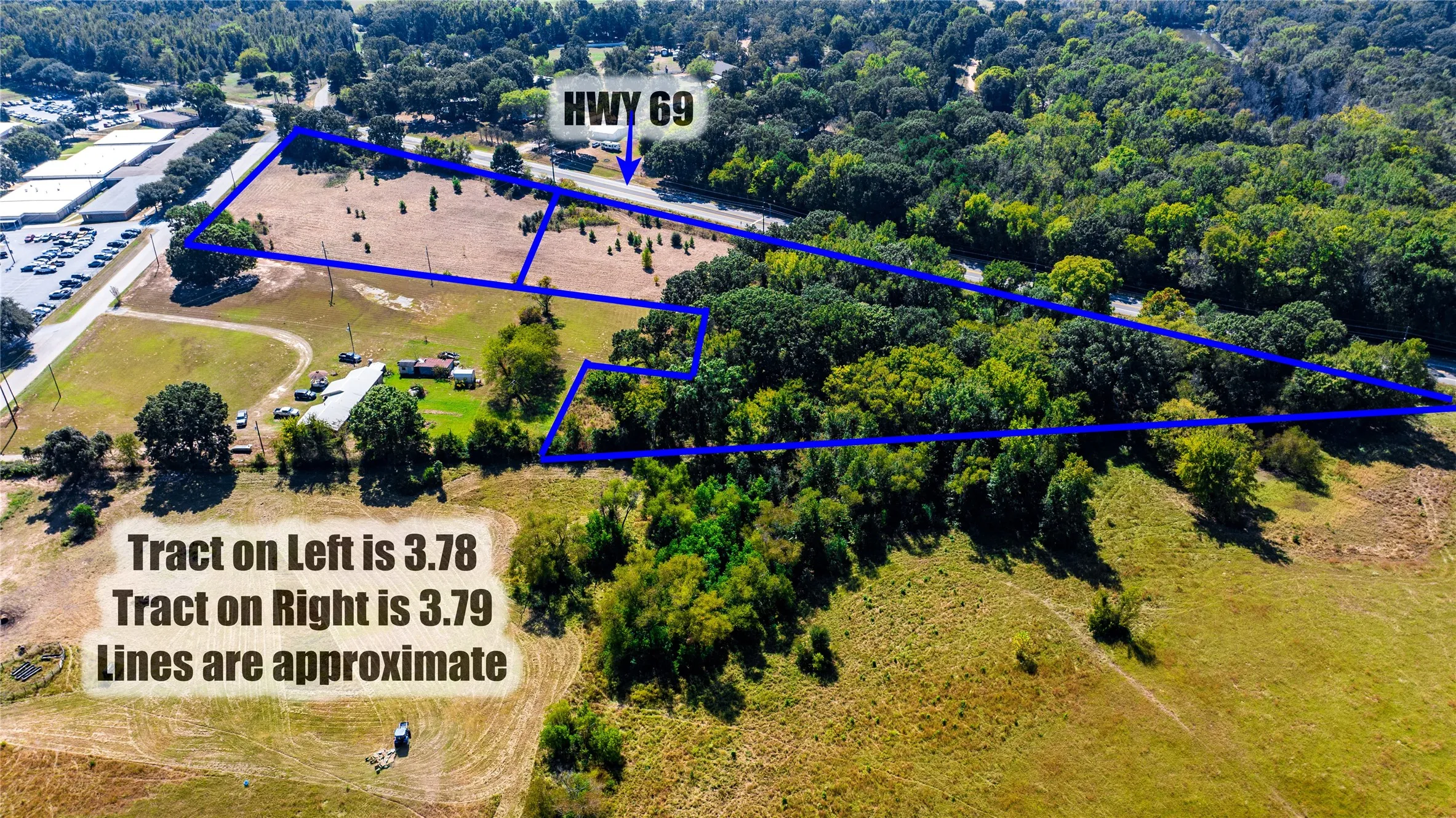 Aerial view of property and surrounding area featuring property boundaries highlighted