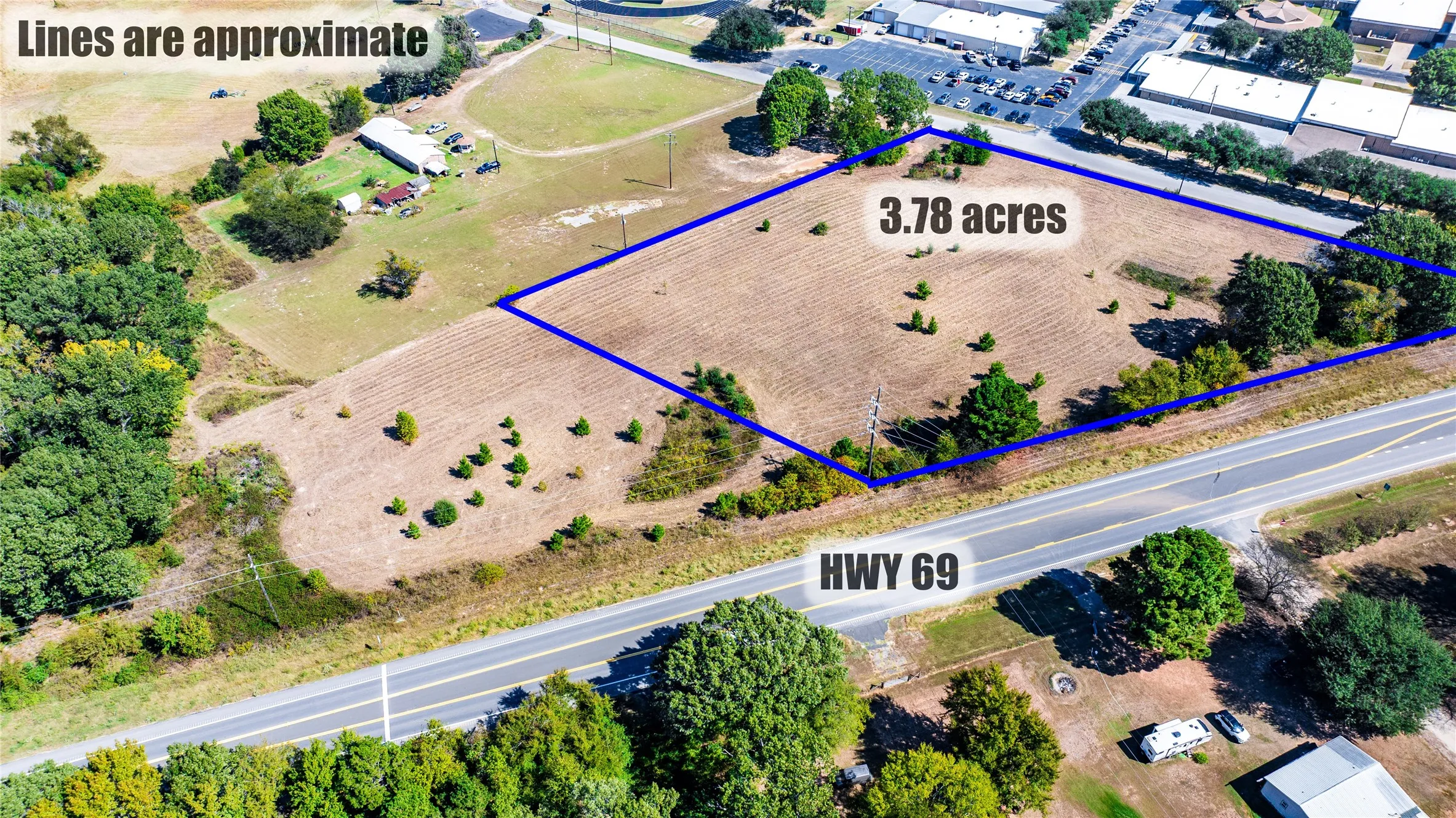 Aerial view of property's location featuring property parcel outlined