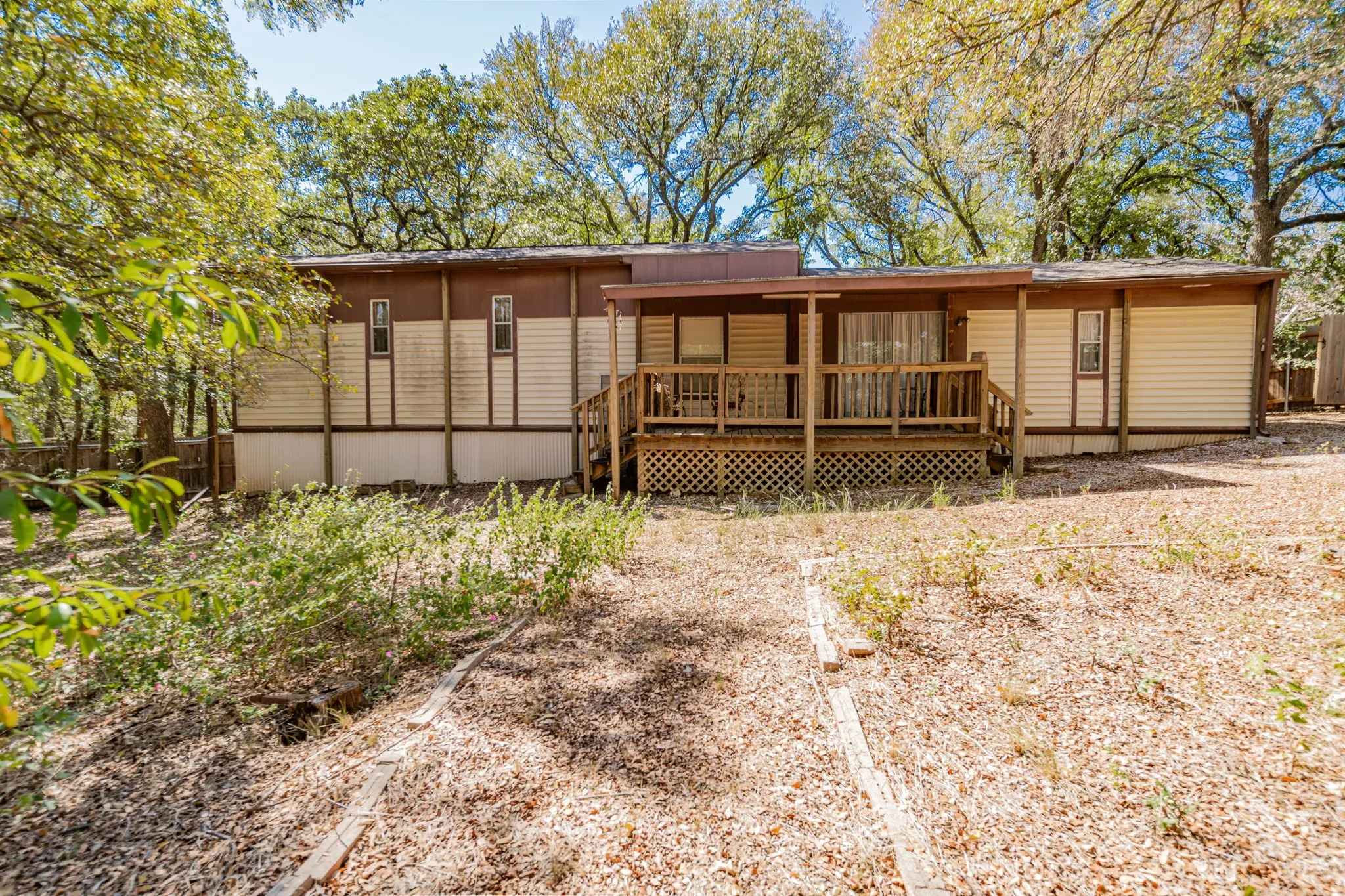 Rear view of property with a wooden deck