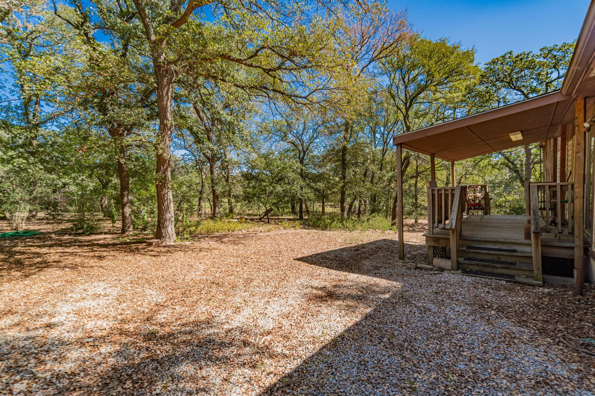 View of yard featuring a deck
