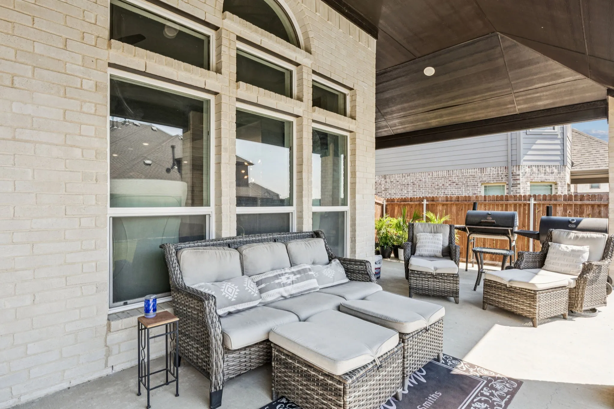 View of patio with an outdoor living space and grilling area