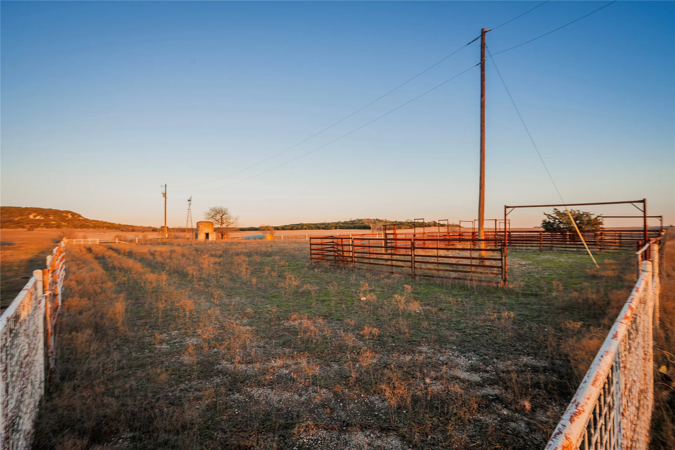 View of yard with a rural view