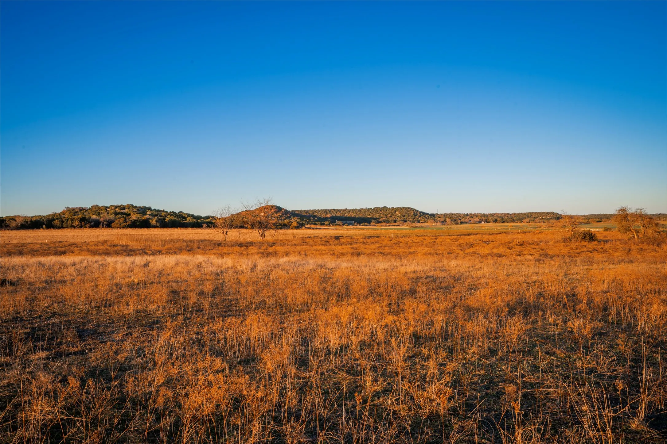 View of undeveloped land featuring rural landscape and mountains