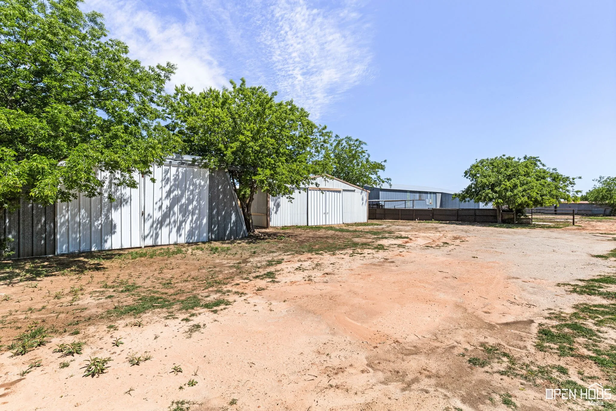 View of yard featuring an outbuilding and an outdoor structure