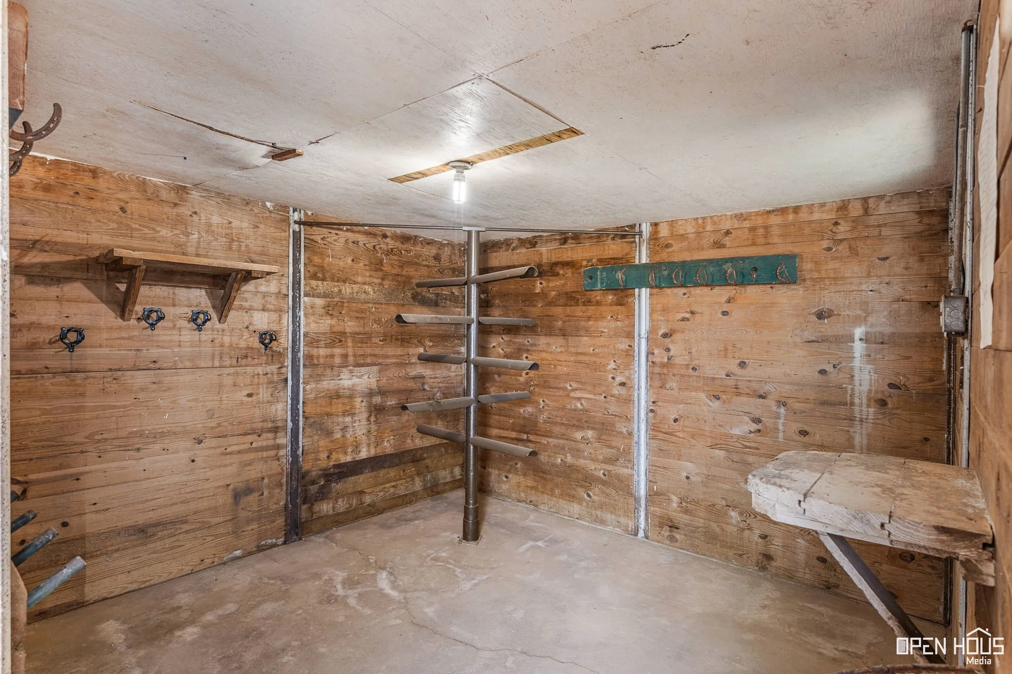 Below grade area with wood walls