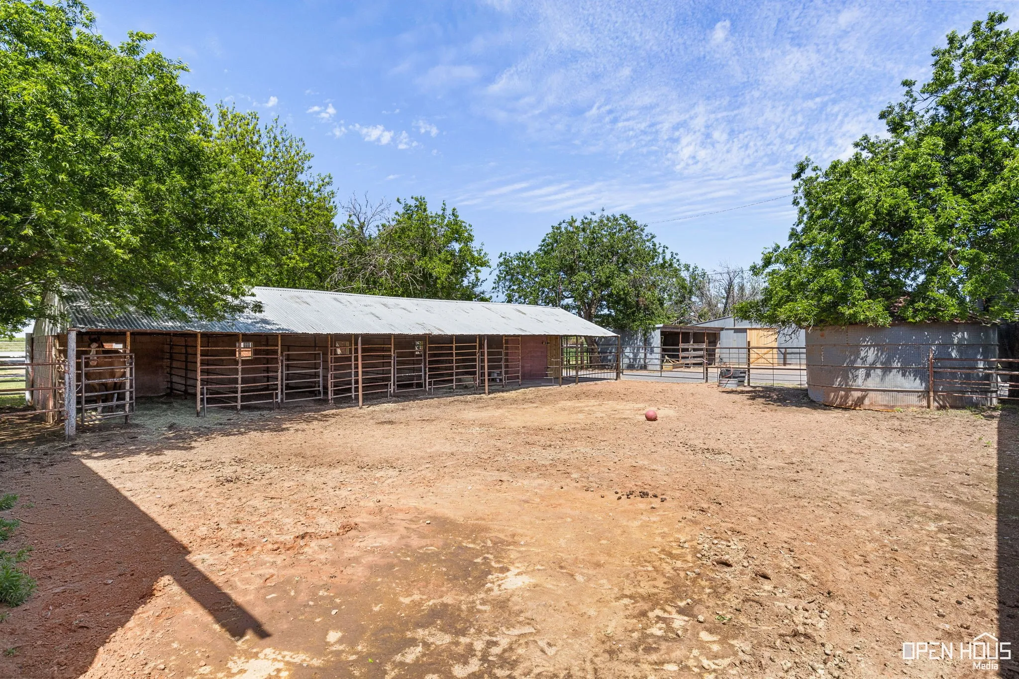 View of yard featuring an outbuilding and an exterior structure