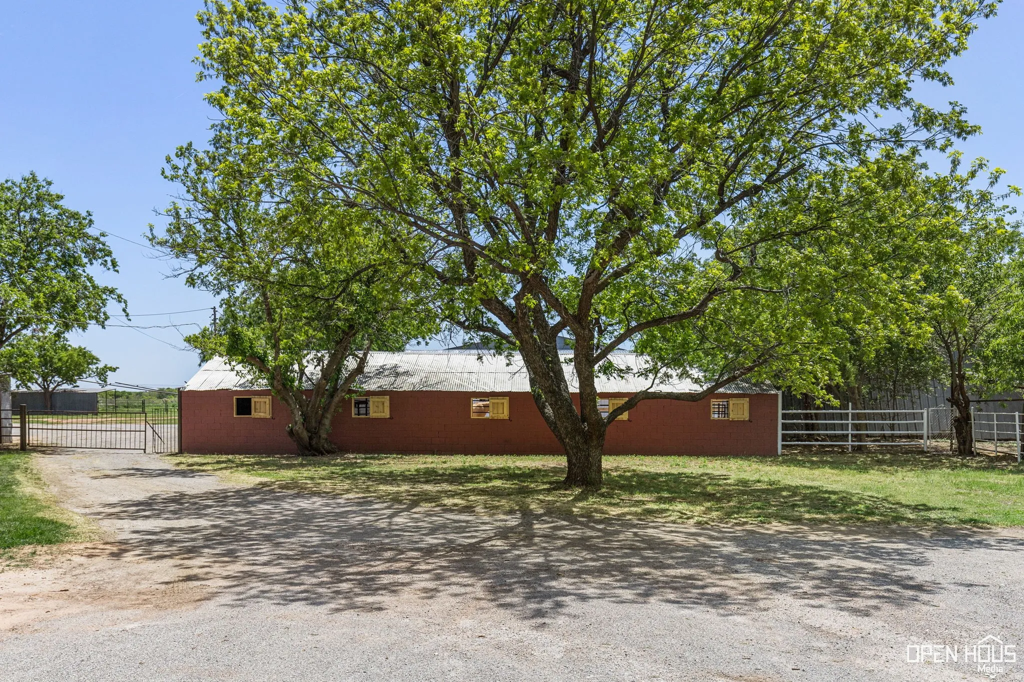 View of property exterior featuring driveway