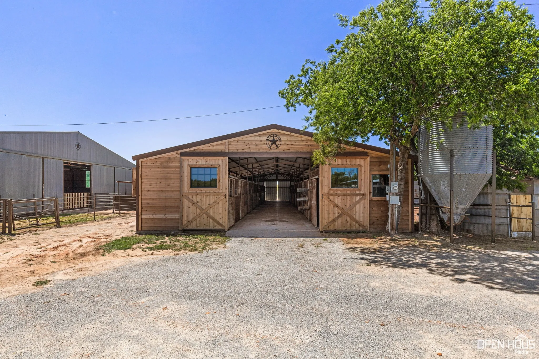 View of front of home with an outdoor structure and an exterior structure