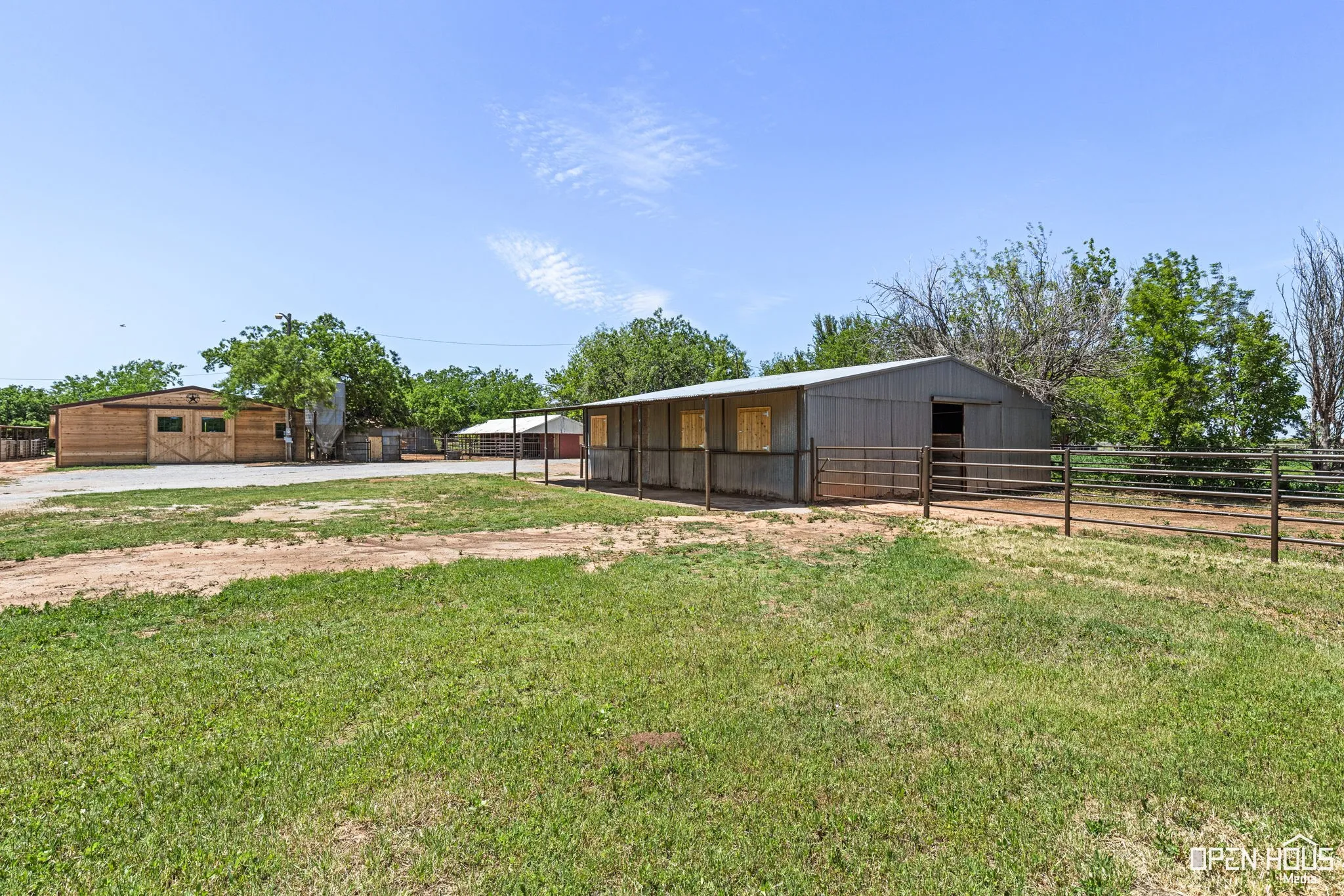 View of yard with an outdoor structure and an exterior structure