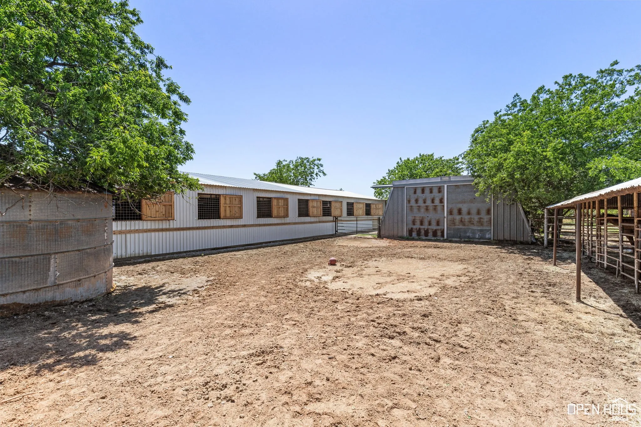 View of yard with an outdoor structure and an exterior structure