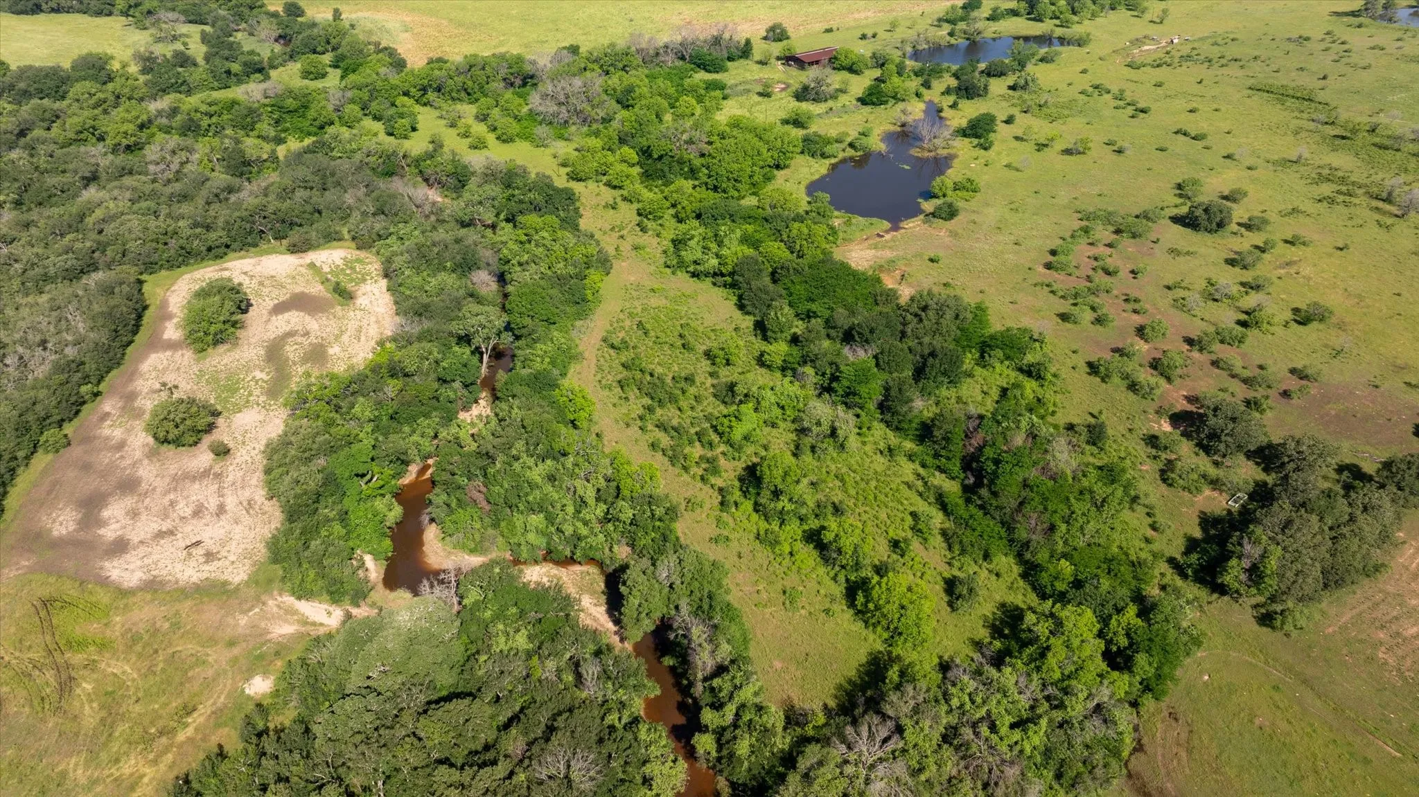 Aerial view of Kickapoo Creek and the back property line.