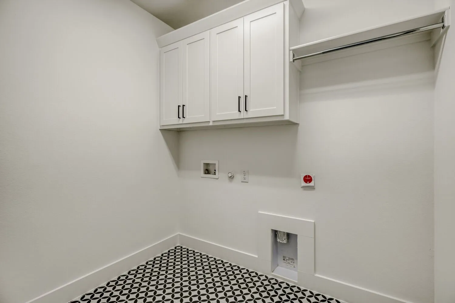 Laundry room featuring hookup for a gas dryer, cabinet space, hookup for a washing machine, and tile patterned floors