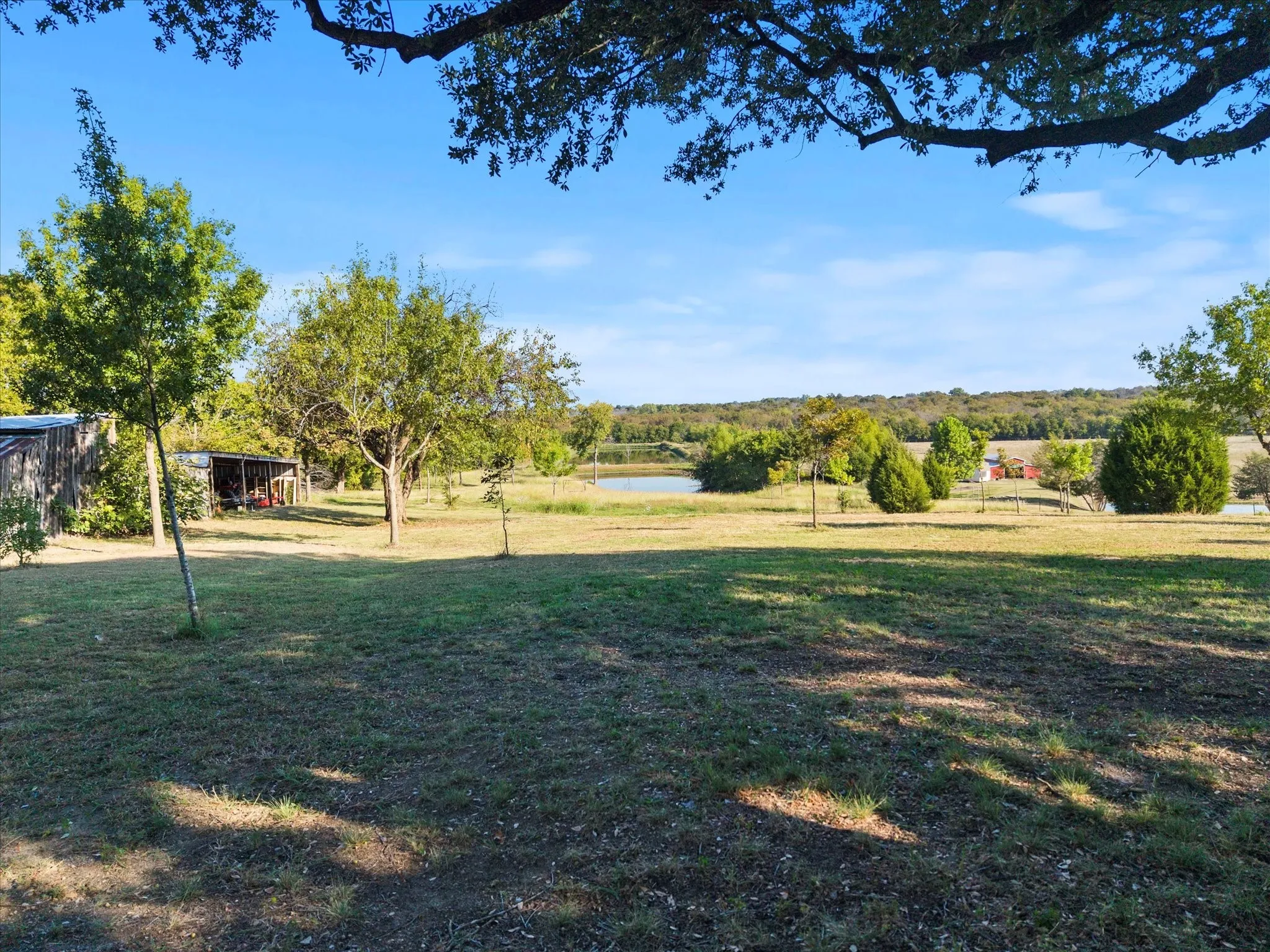 Ground view from back of existing home.