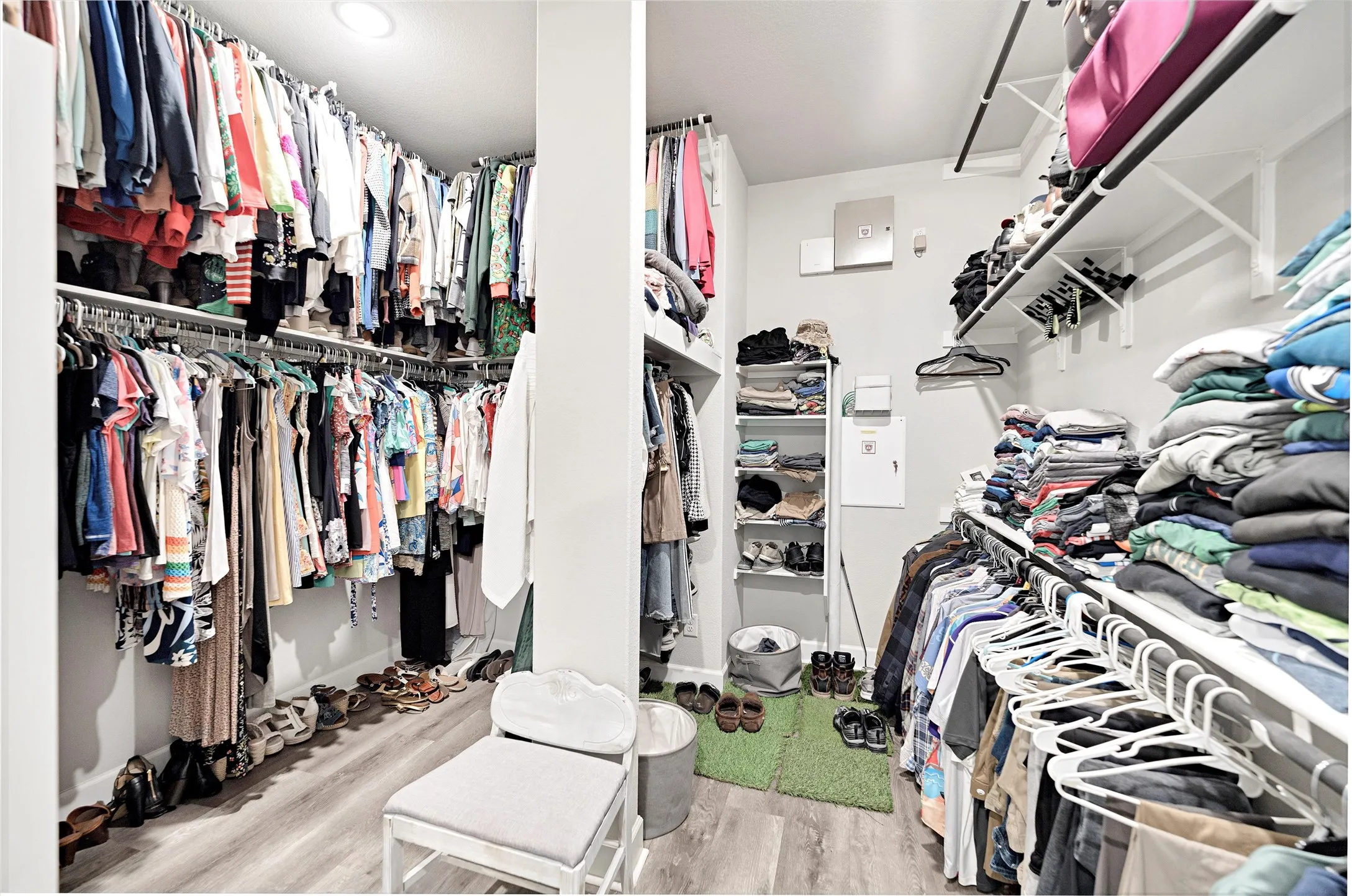 Spacious closet featuring light wood-type flooring