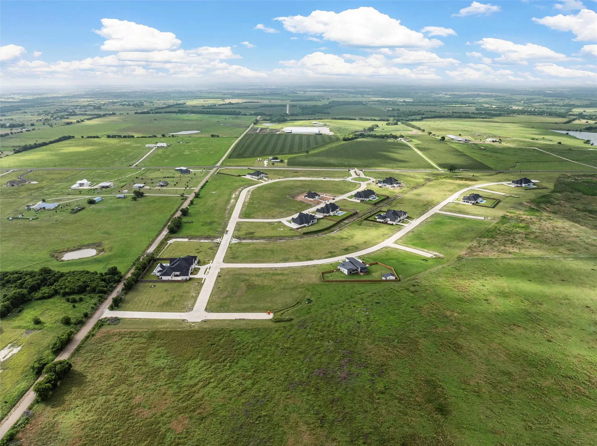 Aerial overview of property's location with rural landscape