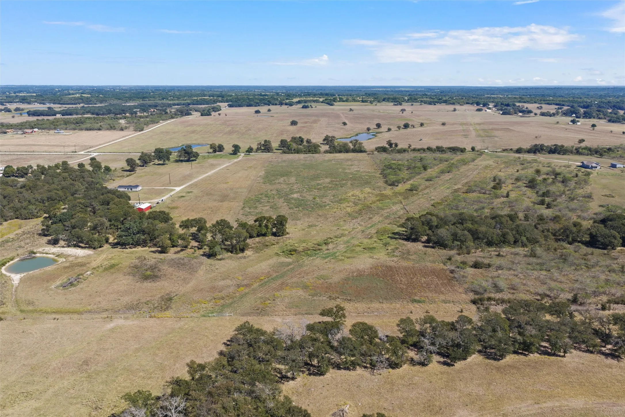 Aerial view of property's location with rural landscape