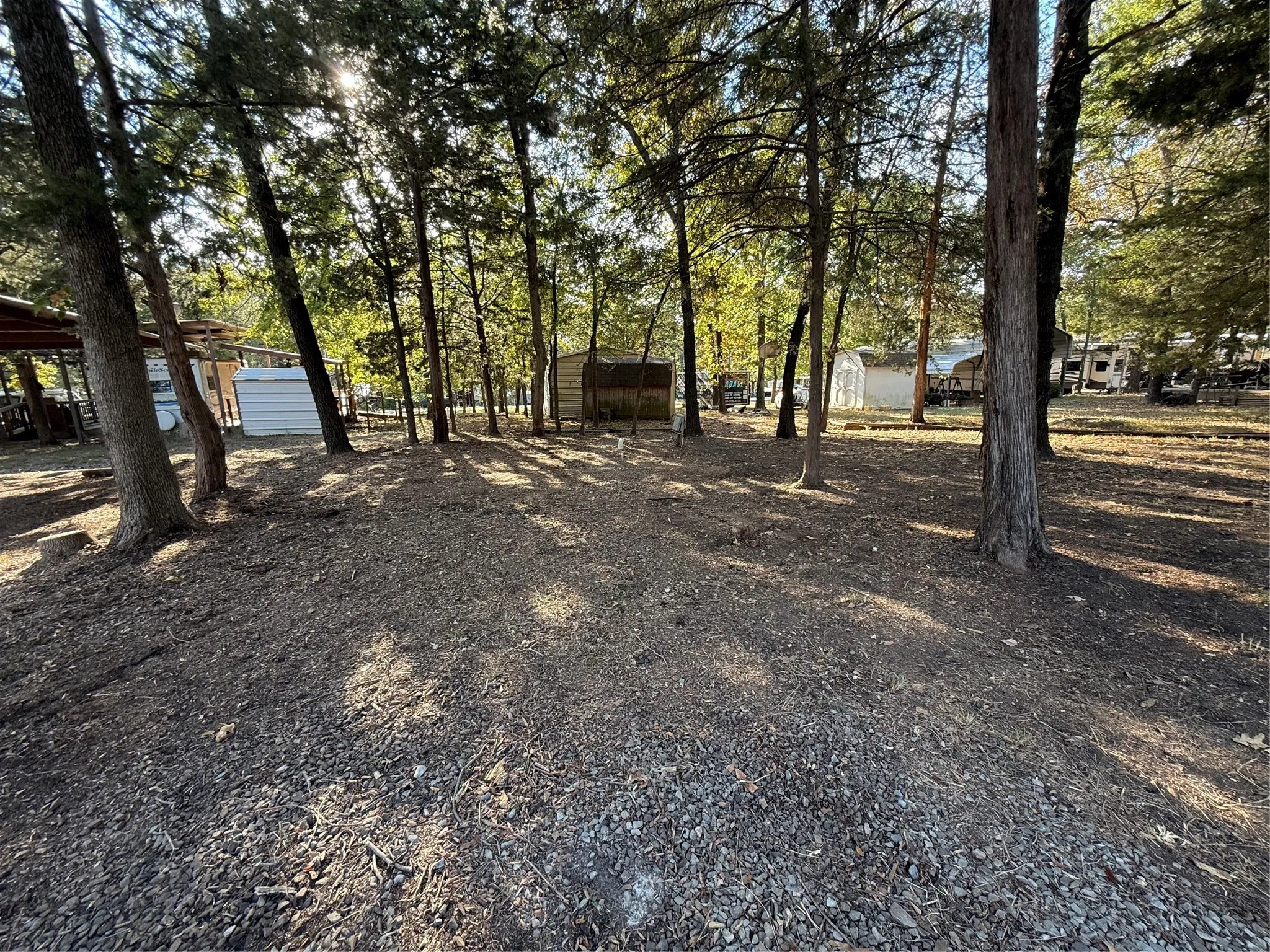 View of lot featuring view of wooded area