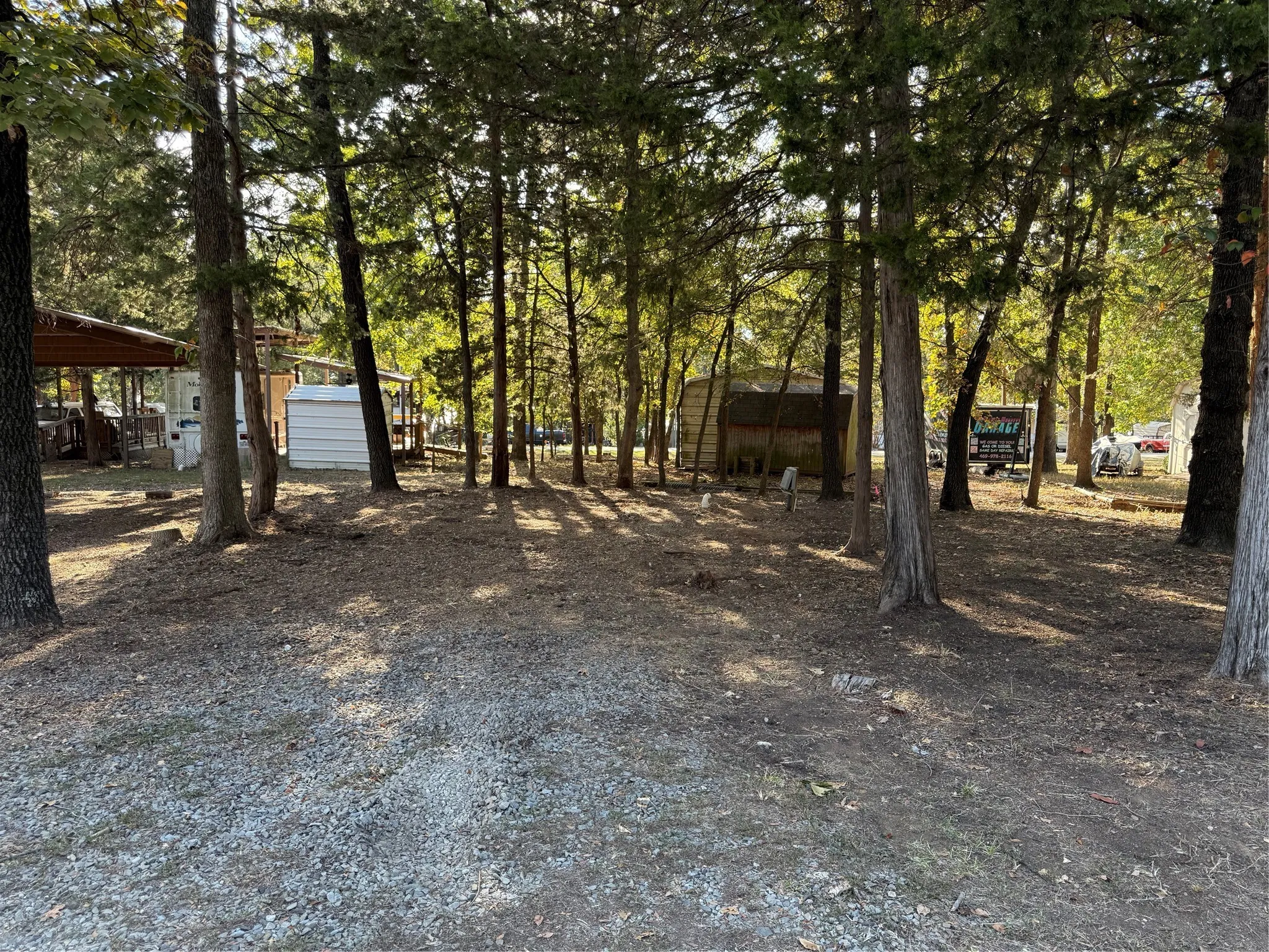 View of lot featuring view of scattered trees