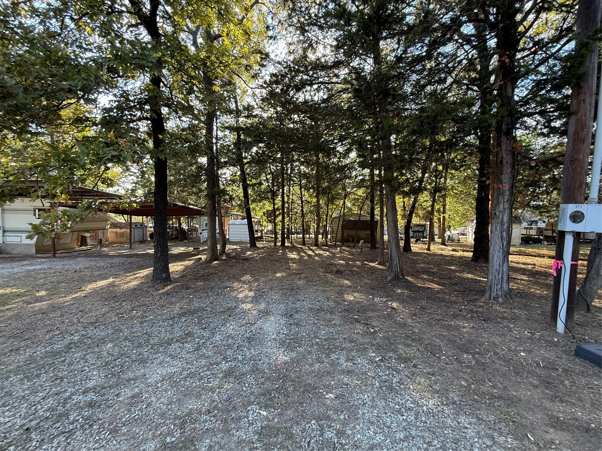 View of lot featuring view of scattered trees